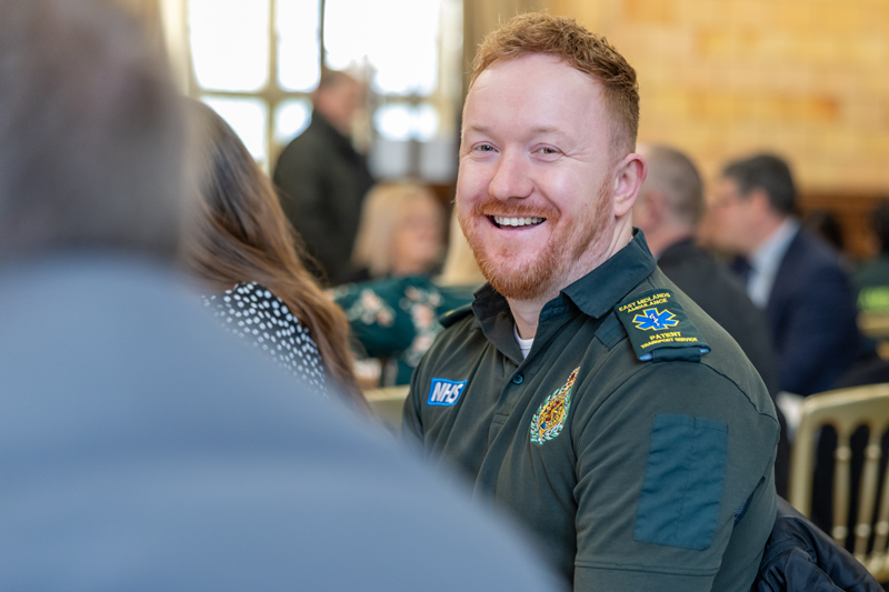 Ben Williamson smiling while sat in the audience at the ceremony