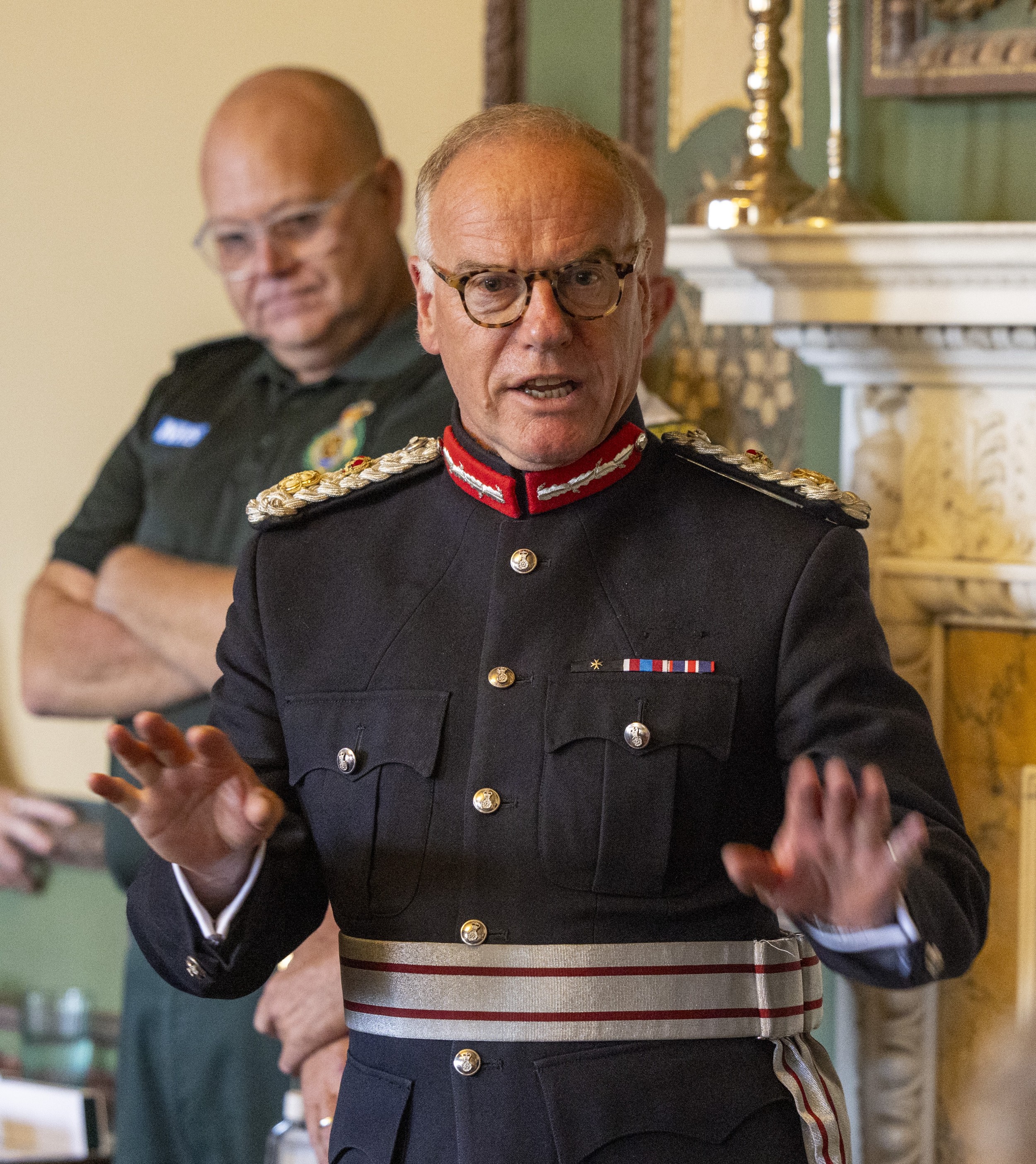 Lord-Lieutenant James Saunders Watson in official attire, addressing the attendees at the ceremony.